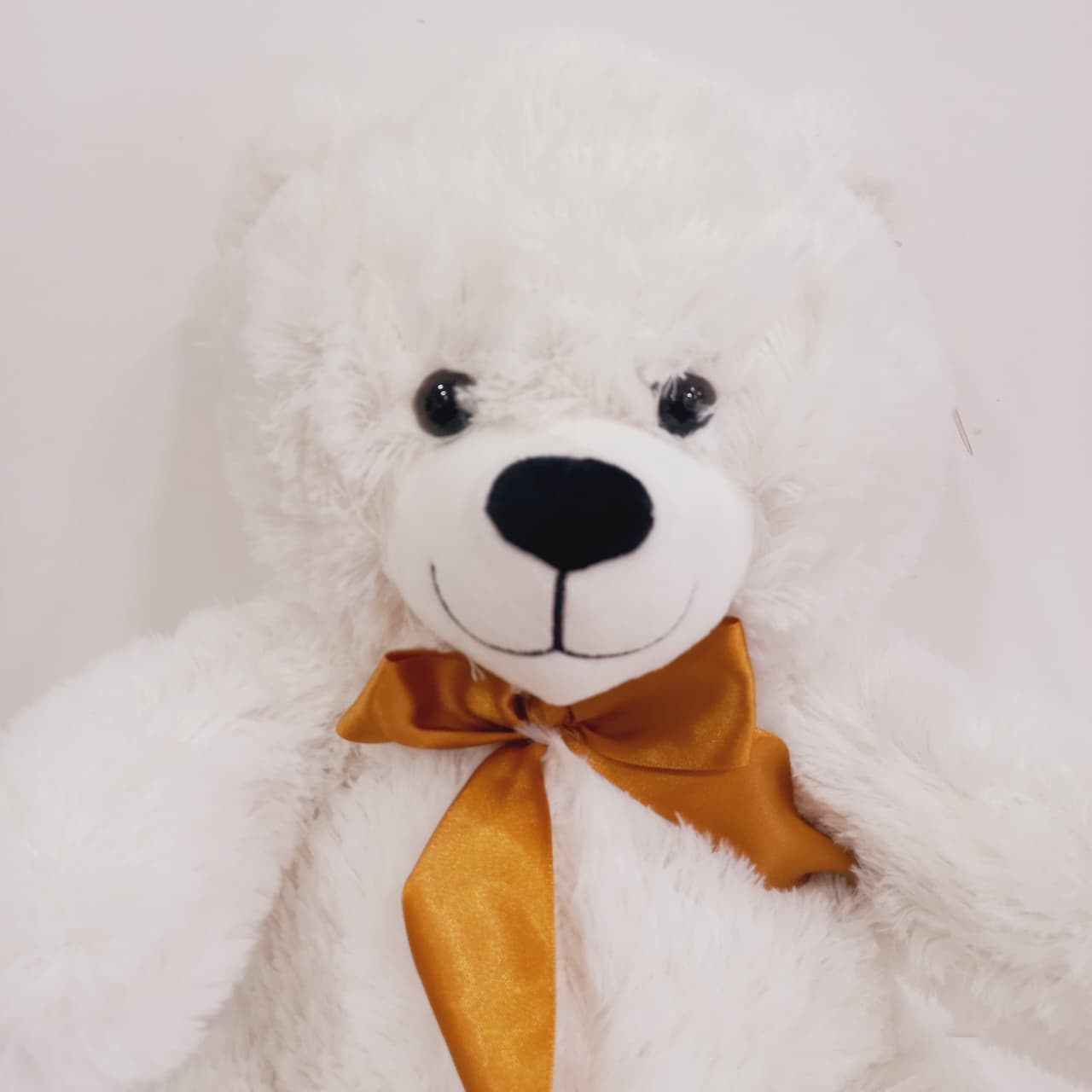 Oso con moño dorado - Imagen 2