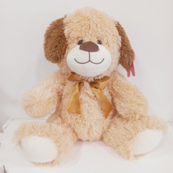 Perro con moño dorado